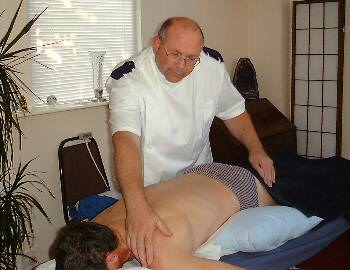 Phil Giving a Spinal Touch Treatment