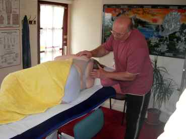 Spinal Touch Treatment on a Pregnant Patient with Back Pain